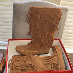 Knee-High Fringed Moccasin style Tan boot with stitching. Never worn w/box!